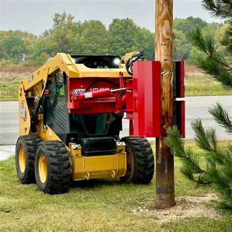 skid steer for pole set|pole setter for digging.